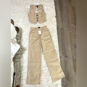 NWT vest and pant set. Size S